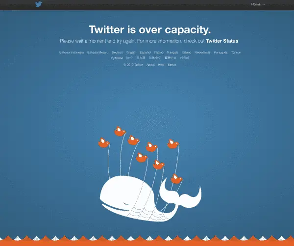 Error page: "Twitter is over capacity". Illustration of small birds carrying a big heavy whale.