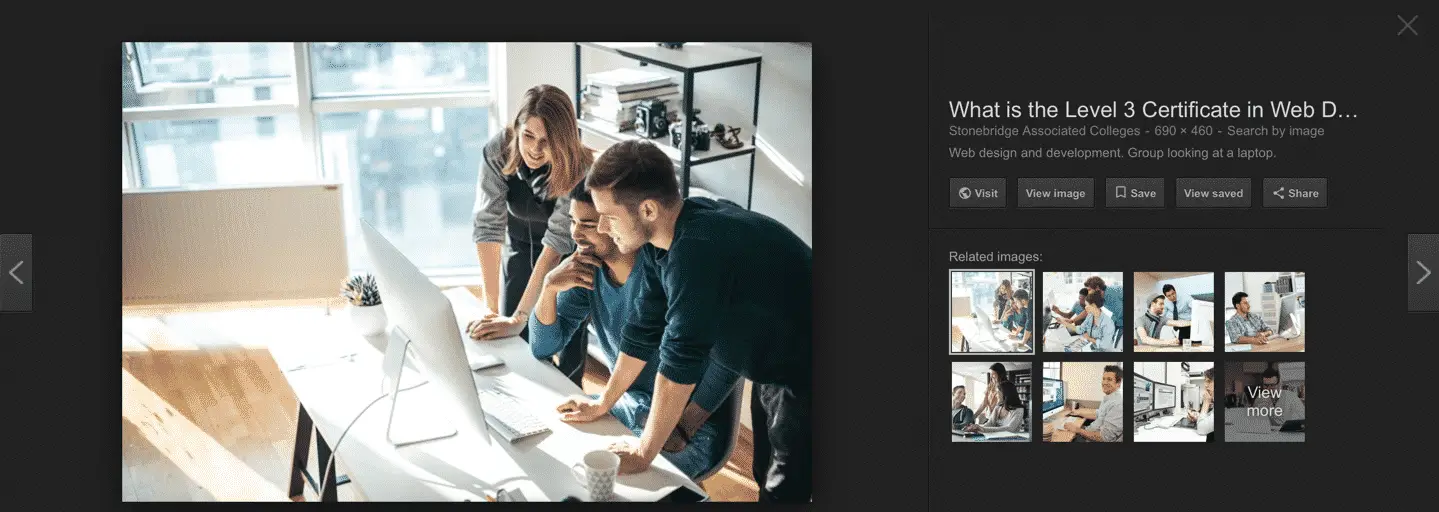 Google image results. Three young people working together by a huge monitor.