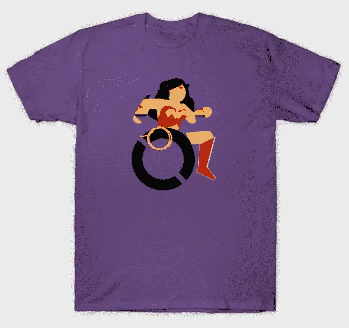 Purple t-shirt with wonderwoman in a wheelchair wearing pride colored wrist bands.