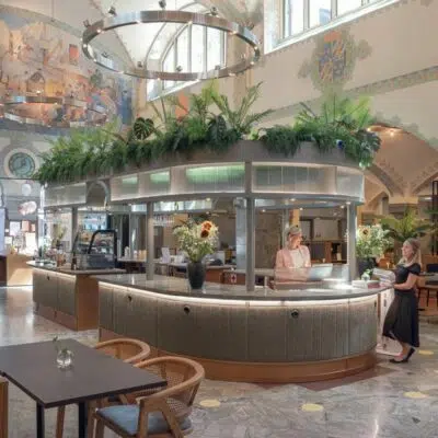 Reception booth with plants on roof